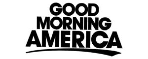 A silhouette of a person with arms raised against a gradient sky background.